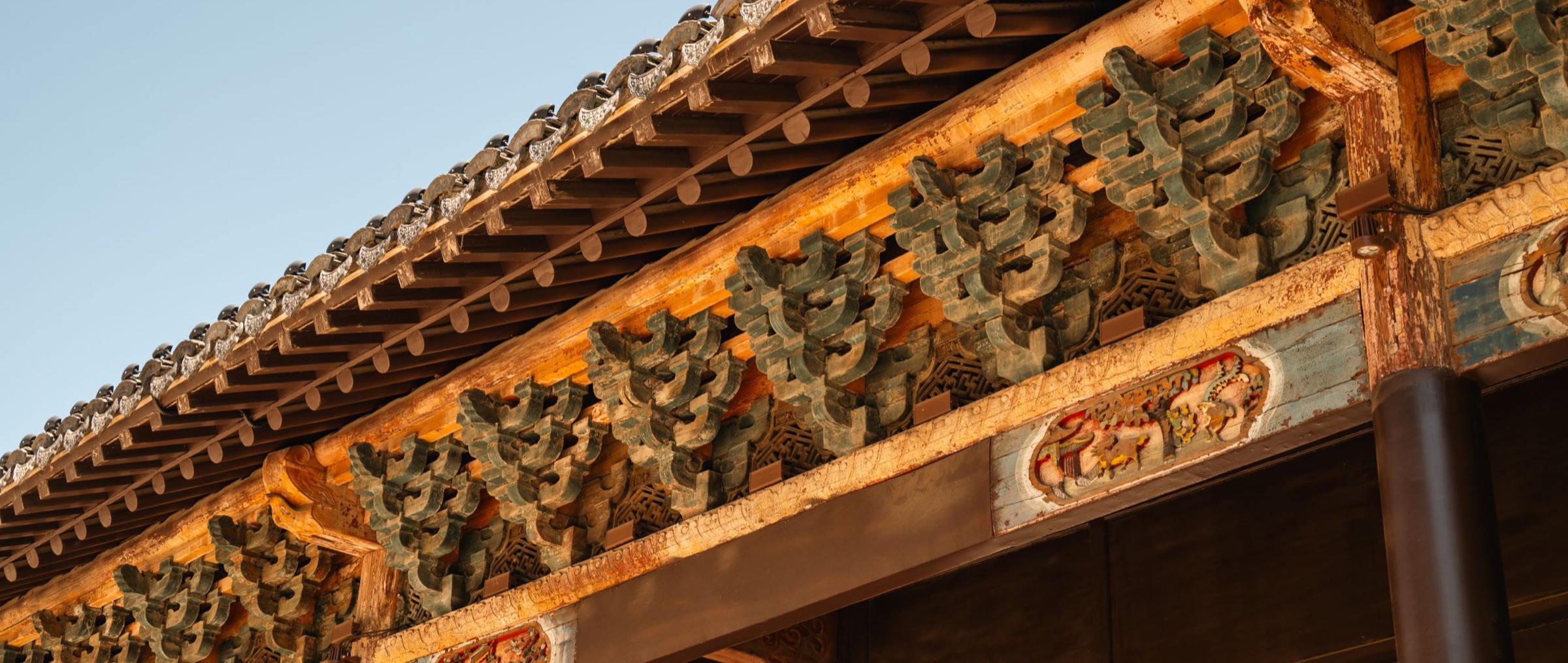 Carved brackets beneath traditional eaves in Nanjing